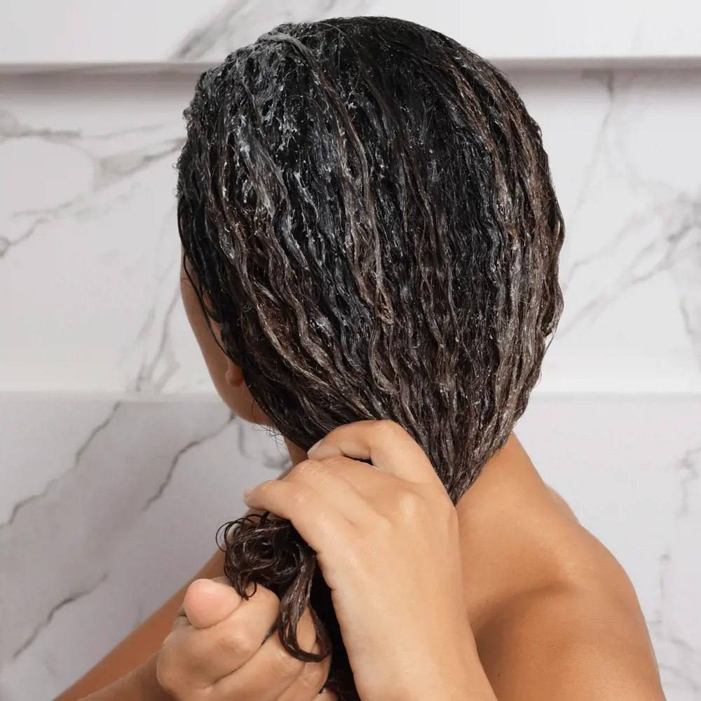 کرم مرطوب‌کننده و حالت‌دهنده‌ی موهای فر دئولوجی